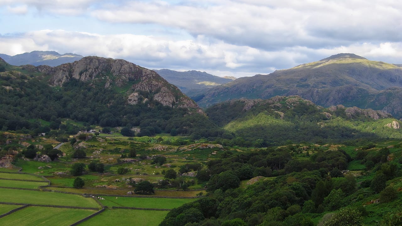 Lake District Landscape showing mountain range and cloudy skies over Duddon Valley