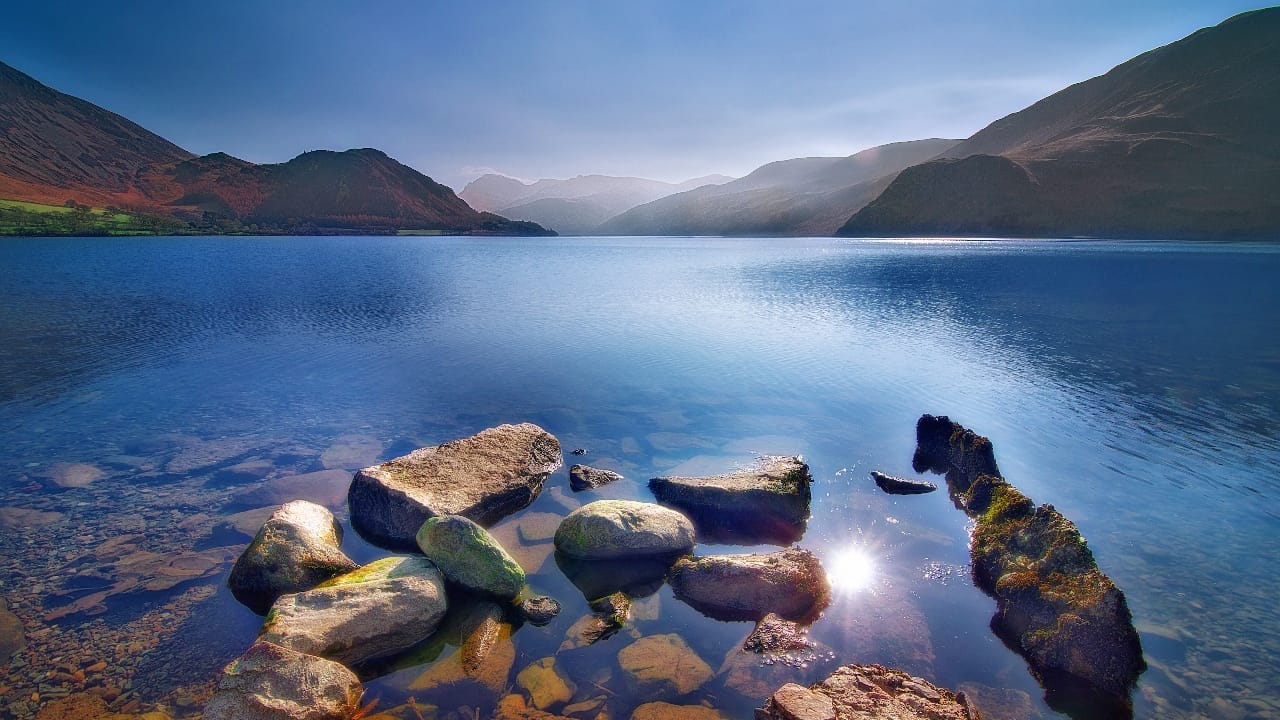 sunlight hitting the water on a lake in the Lake District